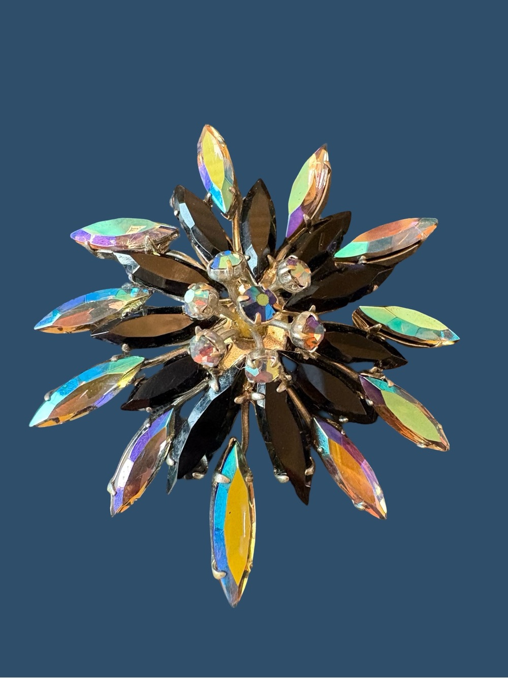 Vintage unsigned black and aurora borealis brooch.